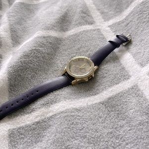 Jessica Carlyle watch with purple band and stainless steel back. Model 6213.